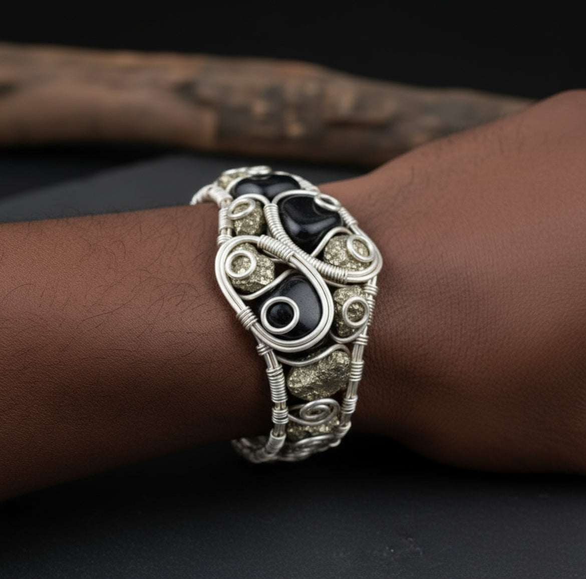 “Pyrite calls in the wealth, Obsidian guards it—abundance protected.” Custom Wire Wrapped Pyrite And Black Obsidian Dual Stone bracelet